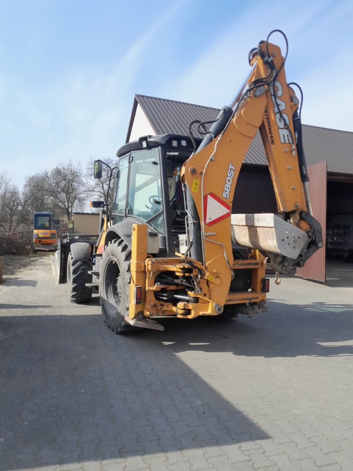 Minikoparka Hanix z wiertnicą - usługi Niegowonice